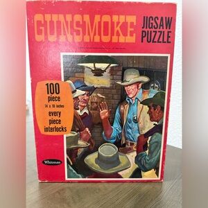 1969 Whitman "Gunsmoke" 100-piece jigsaw puzzle. Key features of the collectible